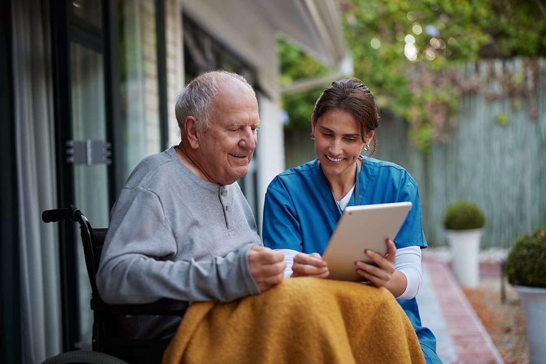 Nurse with patient in hospice